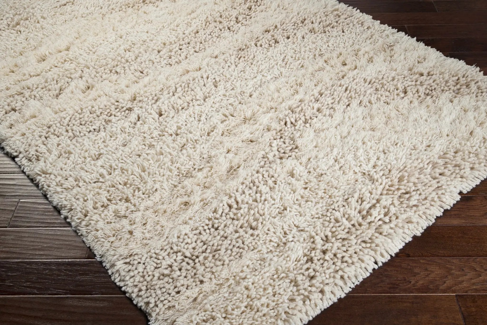 Kettering Solid Cream Wool Shag Rug by Boutique Rugs