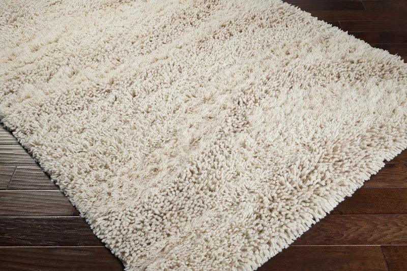 Kettering Solid Cream Wool Shag Rug by Boutique Rugs