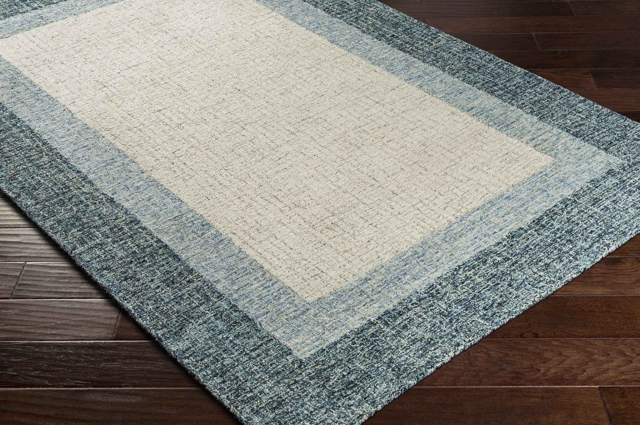 Padada Green Bordered Cream Wool Rug by Boutique Rugs