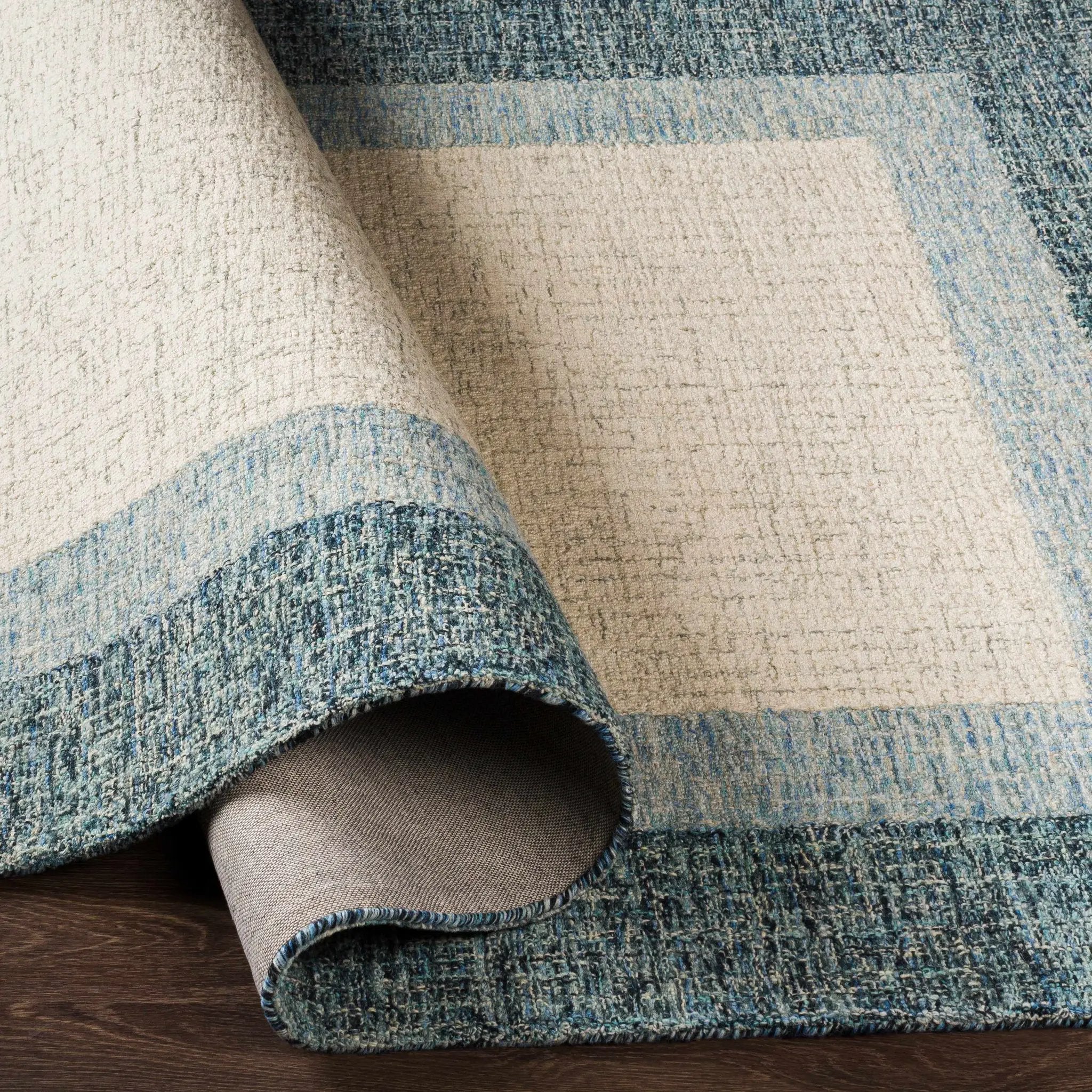 Padada Green Bordered Cream Wool Rug by Boutique Rugs