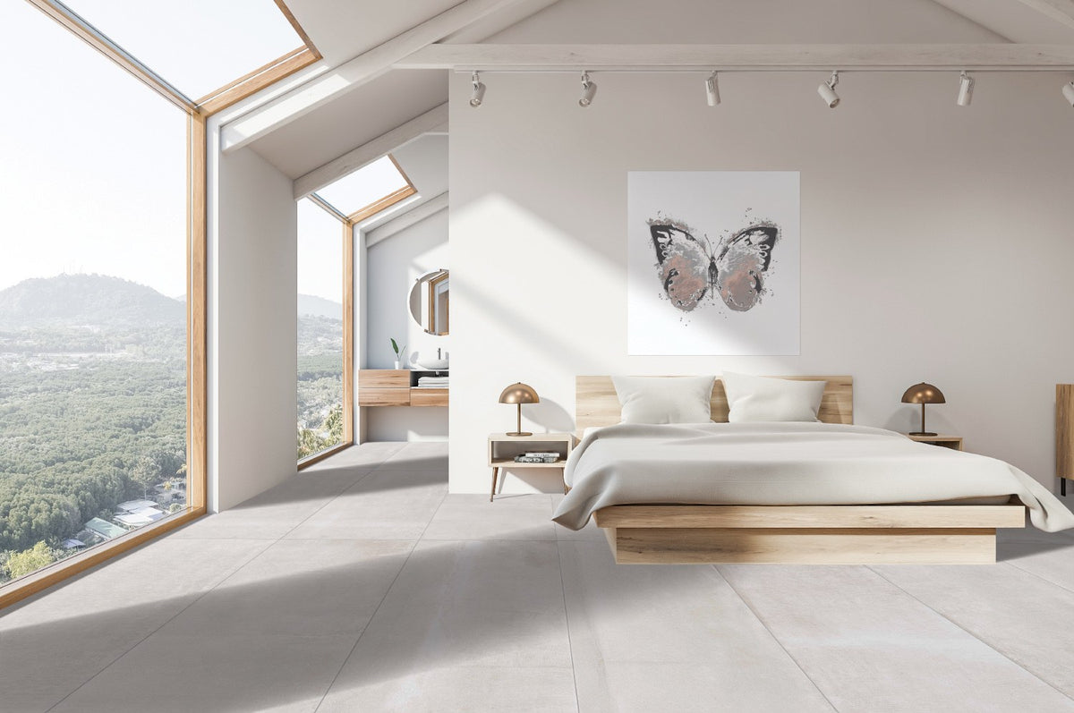 Reside Beige Honed Stone Look Cove Base Porcelain Trim 6x12 installed in a bedroom