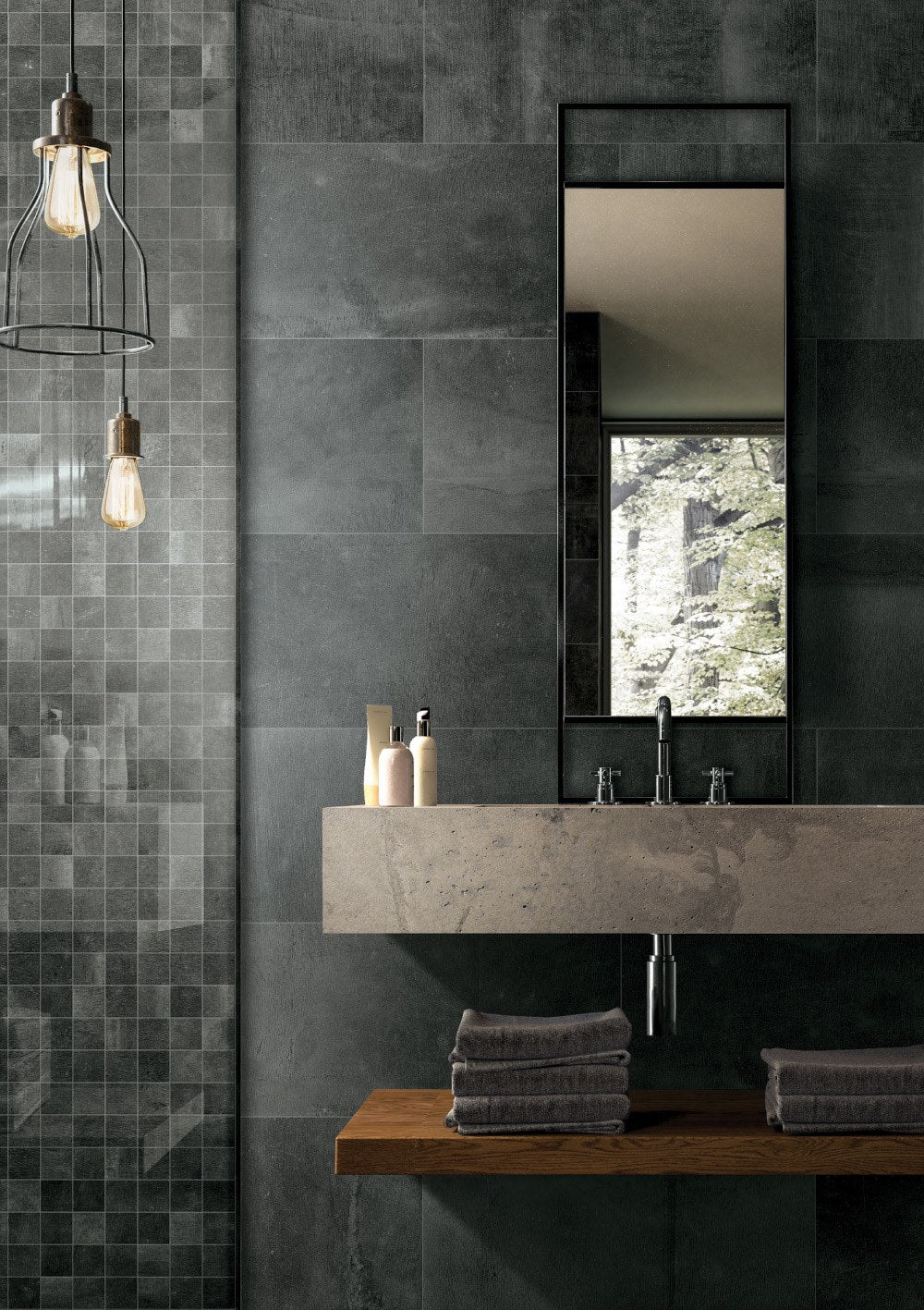 Reside Black Honed 2x2 Stone Look Porcelain Mosaics 12x12 installed in a bathroom