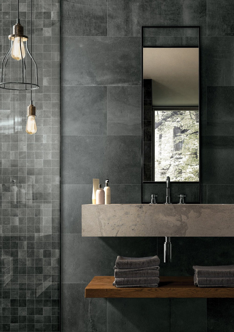 Reside Black Honed 2x2 Stone Look Porcelain Mosaics 12x12 installed in a bathroom