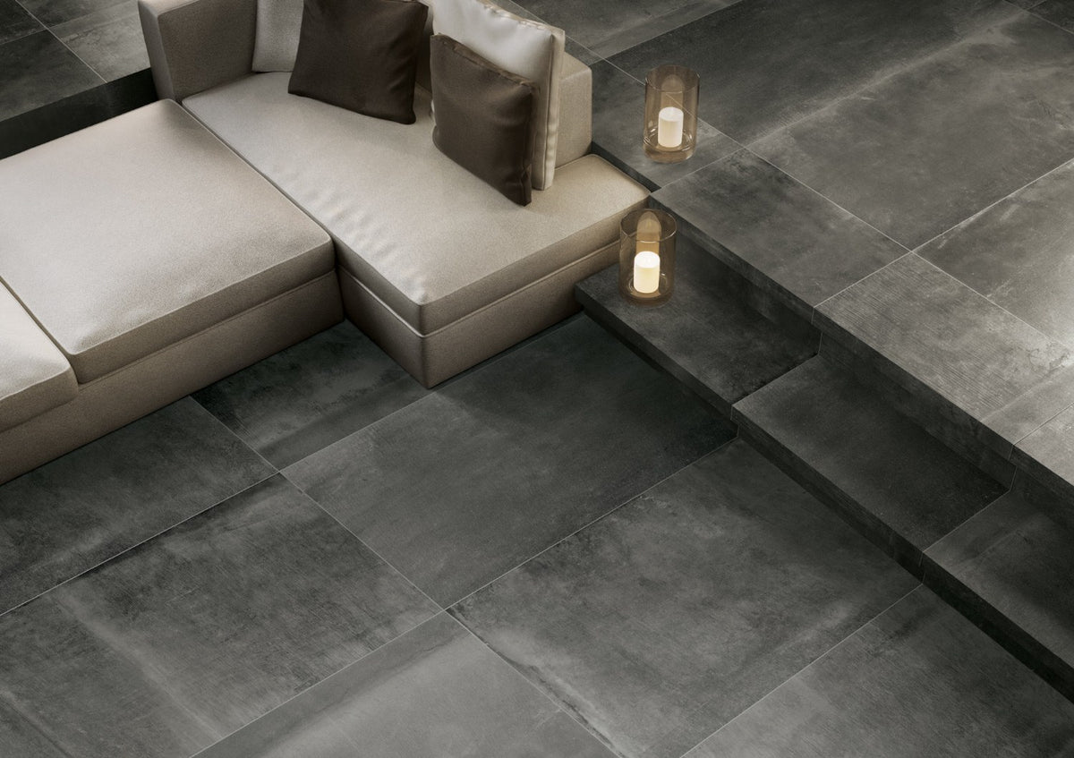 Reside Black R11 Textured Stone Look Porcelain Tiles 24x48 installed in a living room