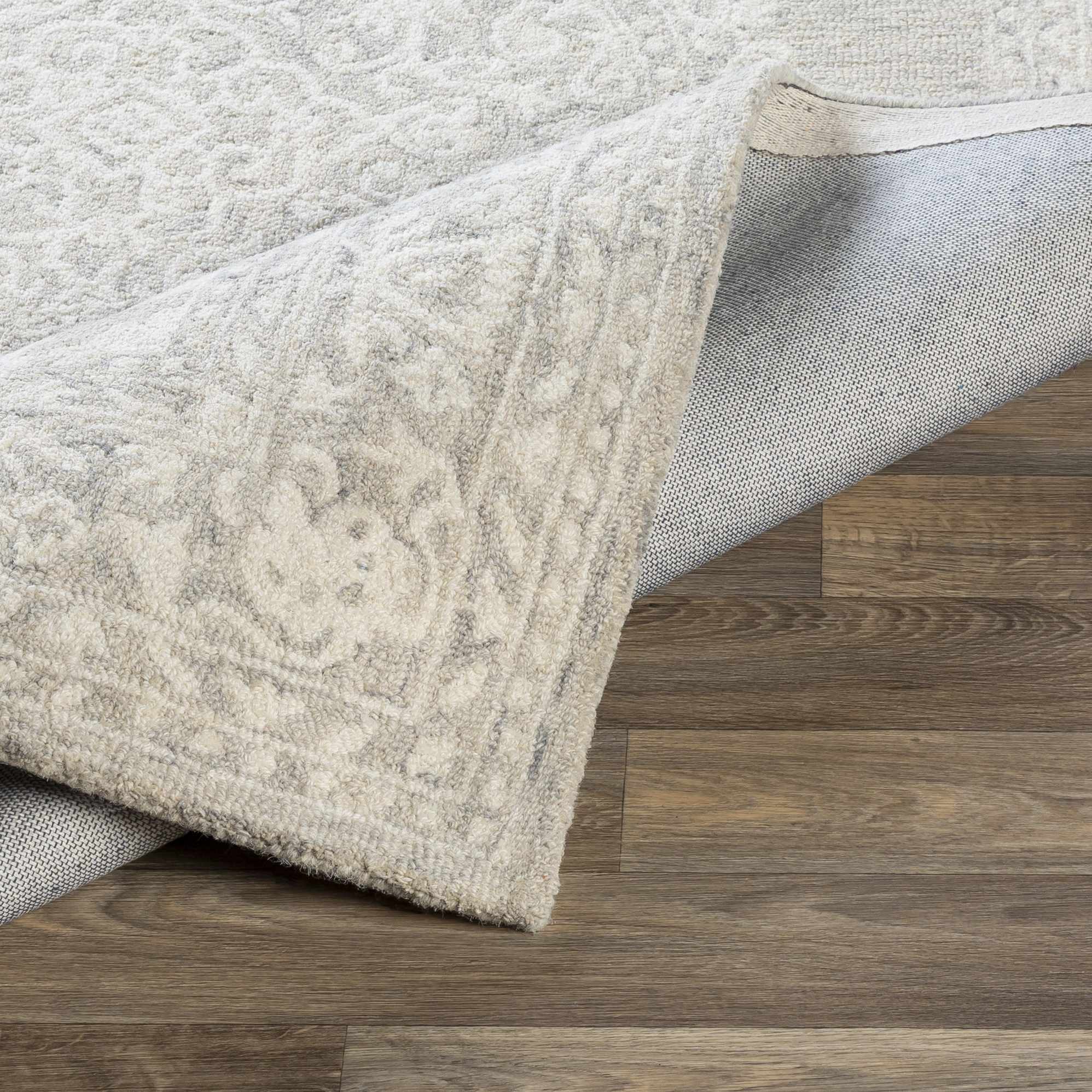 Roessleville Cream Wool Area Rug by Boutique Rugs