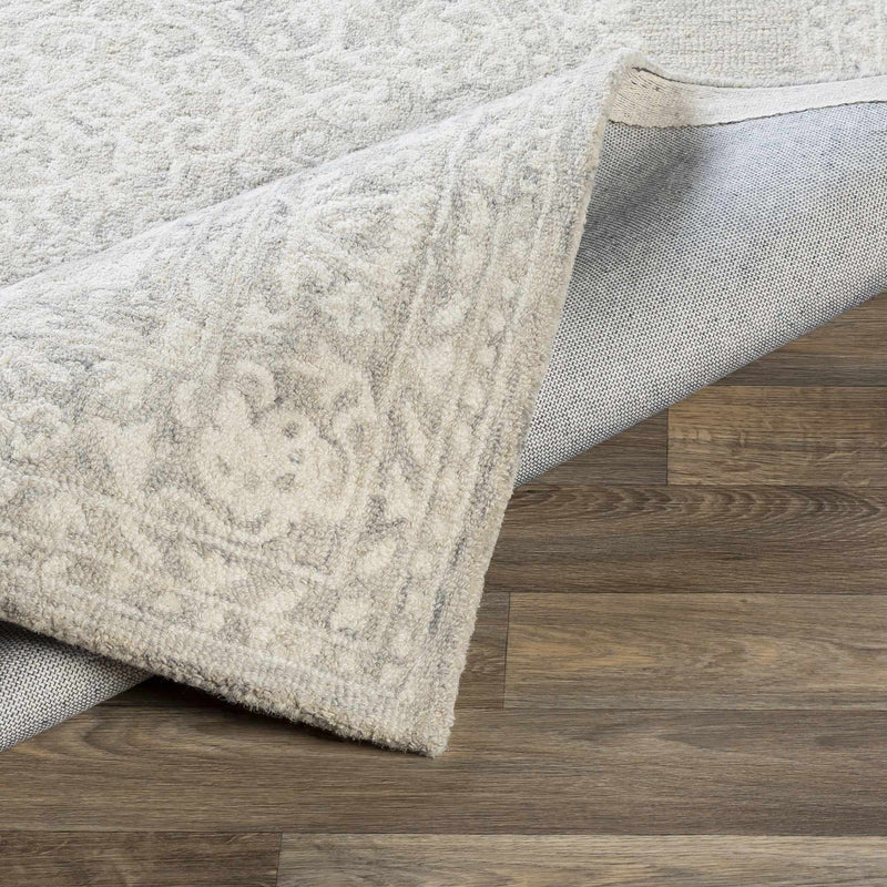 Roessleville Cream Wool Area Rug by Boutique Rugs