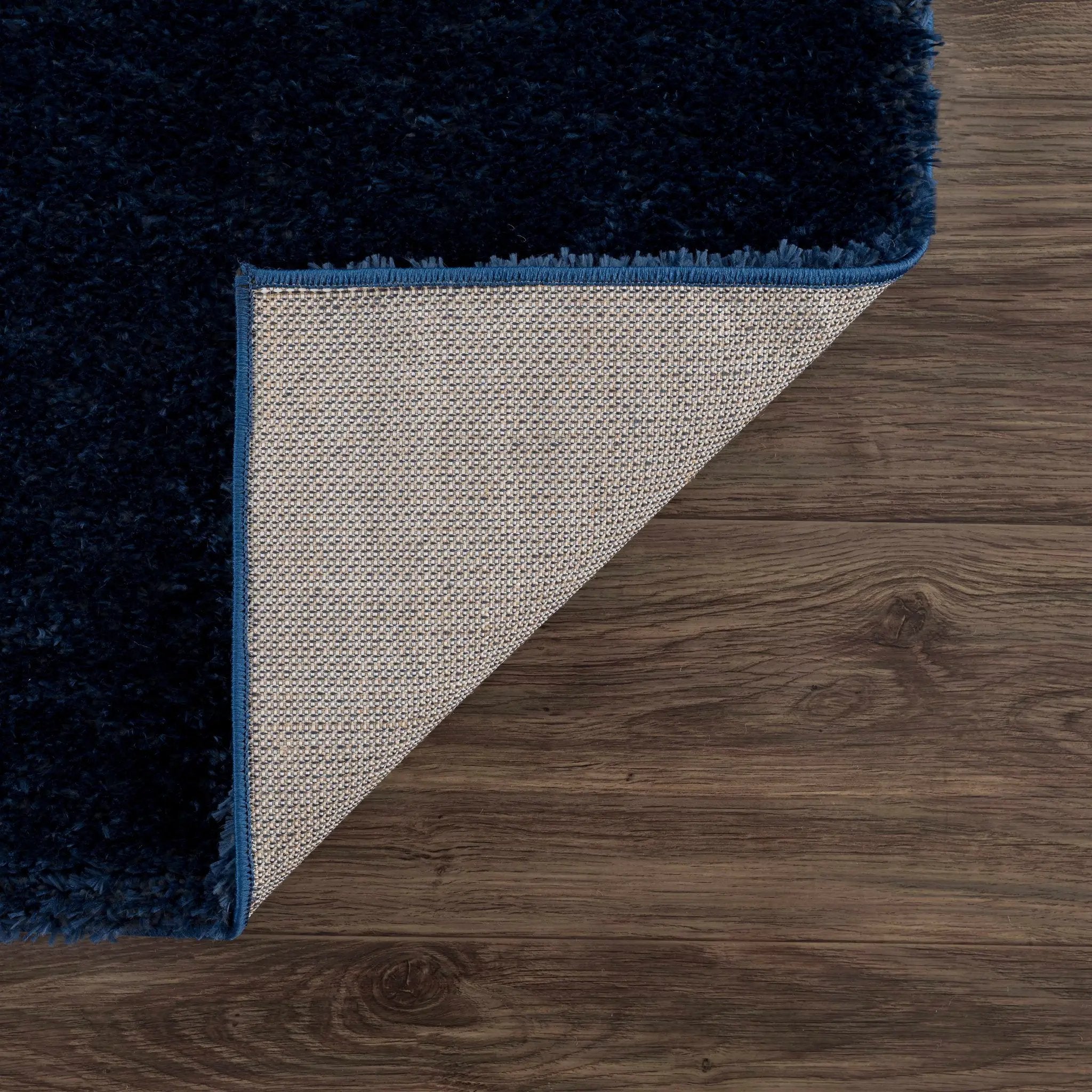 Navero Dark Blue Subtle Wavy Abstract Modern Minimalist Polyester Machine Woven Area Rug - Clearance by Boutique Rugs
