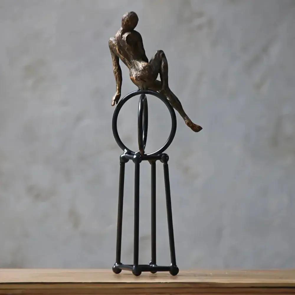 Abstract Seated Figure Sculpture on Geometric Stand – Modern Iron Table Decor by House Of Avana