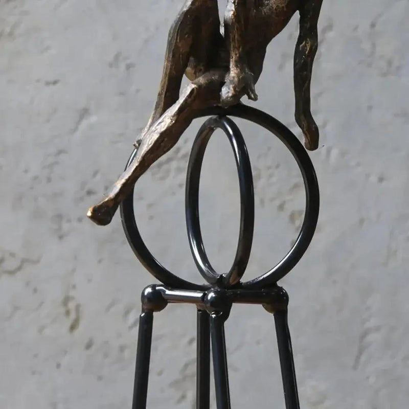 Abstract Seated Figure Sculpture on Geometric Stand – Modern Iron Table Decor by House Of Avana