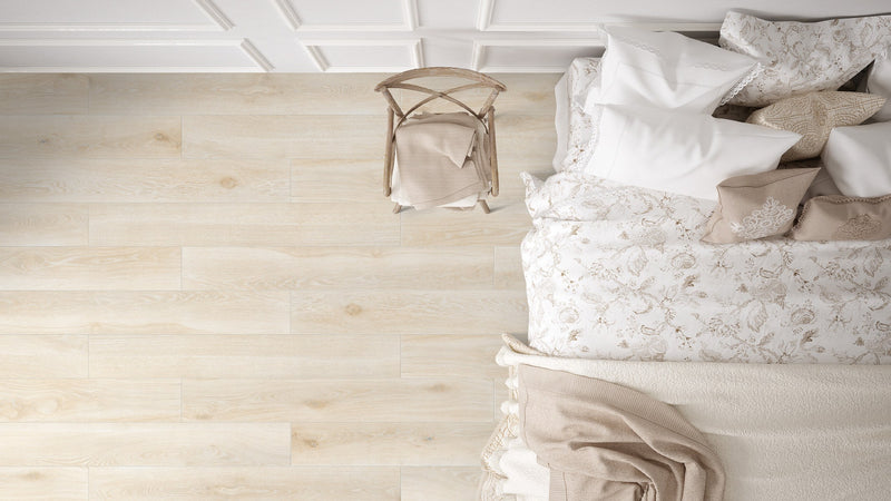 Selva Aspen Natural Plank Wood Look Porcelain Tiles 10x72 installed in a bedroom