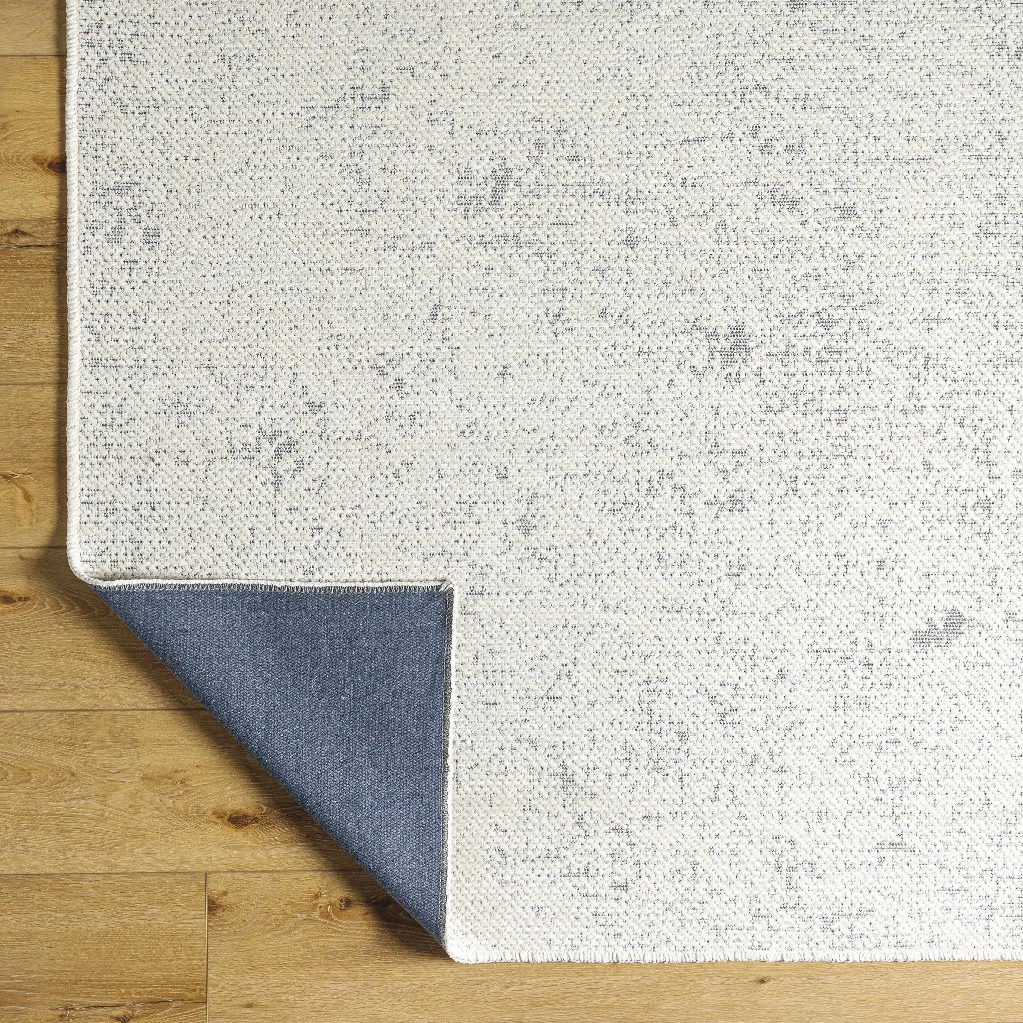 Isako Gray Solid Washable Area Rug - Clearance by Boutique Rugs