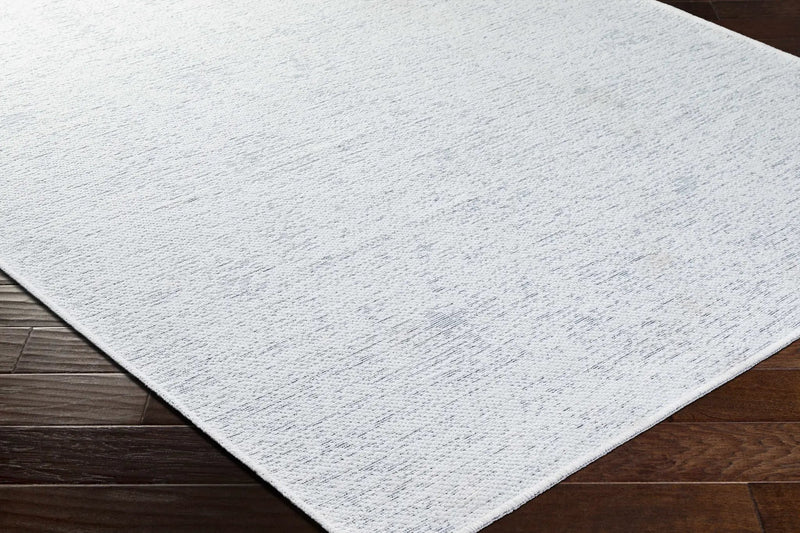 Isako Cream & Gray Solid Washable Area Rug - Clearance by Boutique Rugs