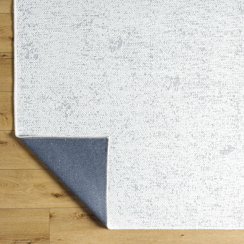 Isako Cream & Gray Solid Washable Area Rug - Clearance by Boutique Rugs
