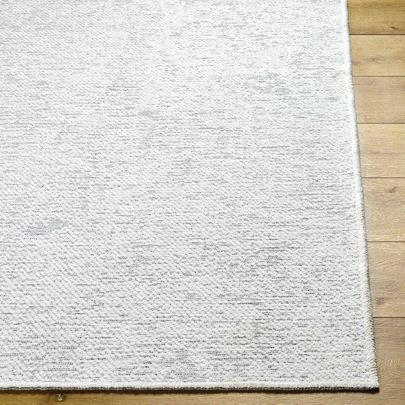 Isako Cream & Gray Solid Washable Area Rug - Clearance by Boutique Rugs
