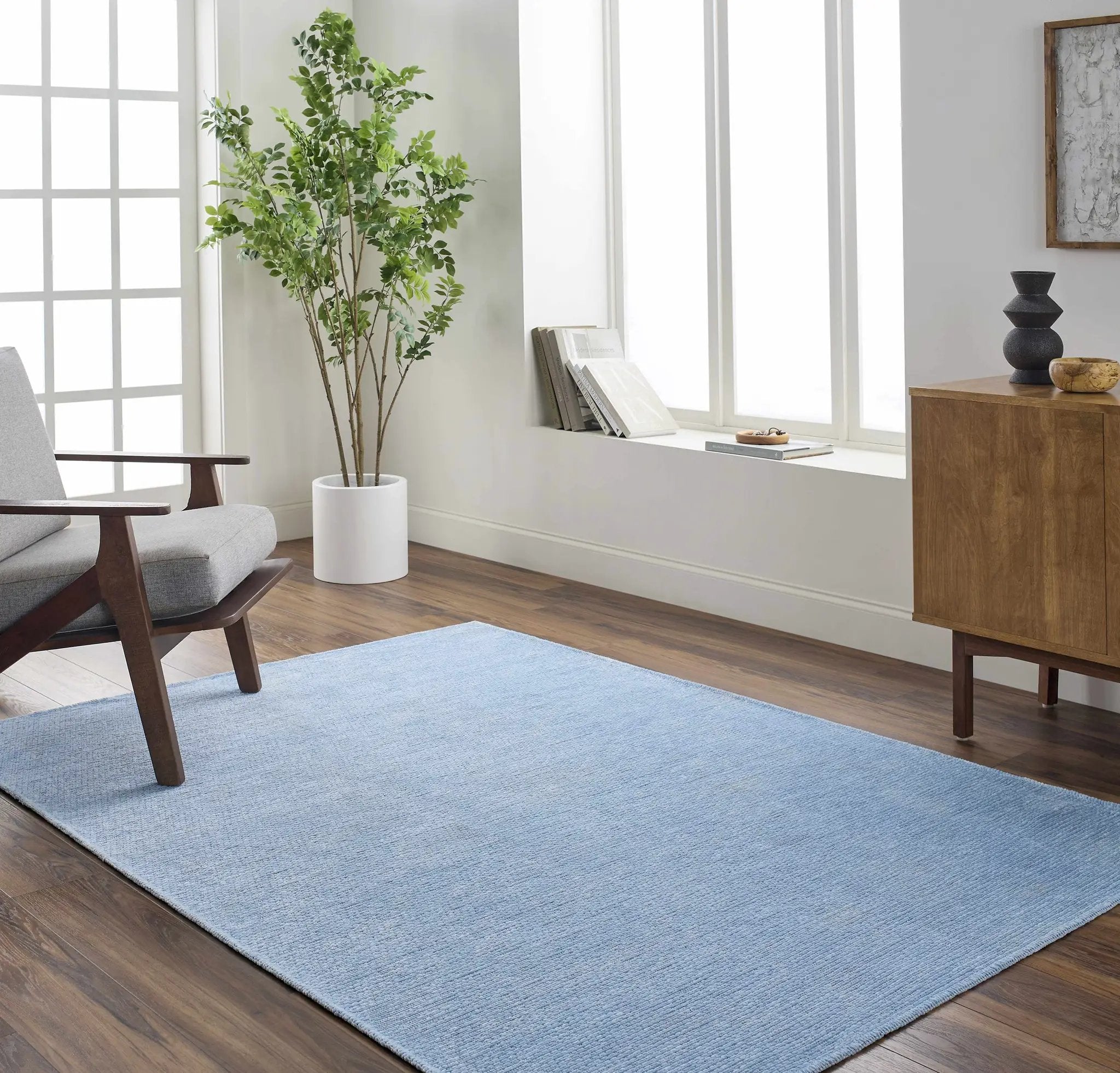 Isako Blue Solid Washable Area Rug - Clearance by Boutique Rugs
