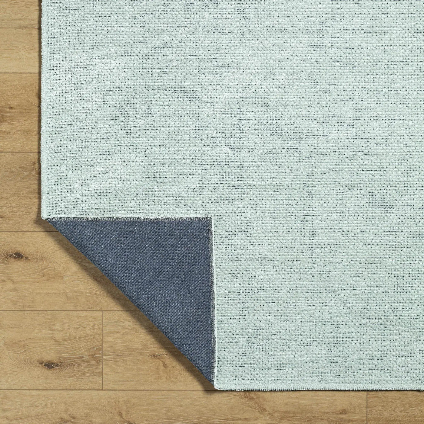 Isako Seafoam Solid Washable Area Rug - Clearance by Boutique Rugs