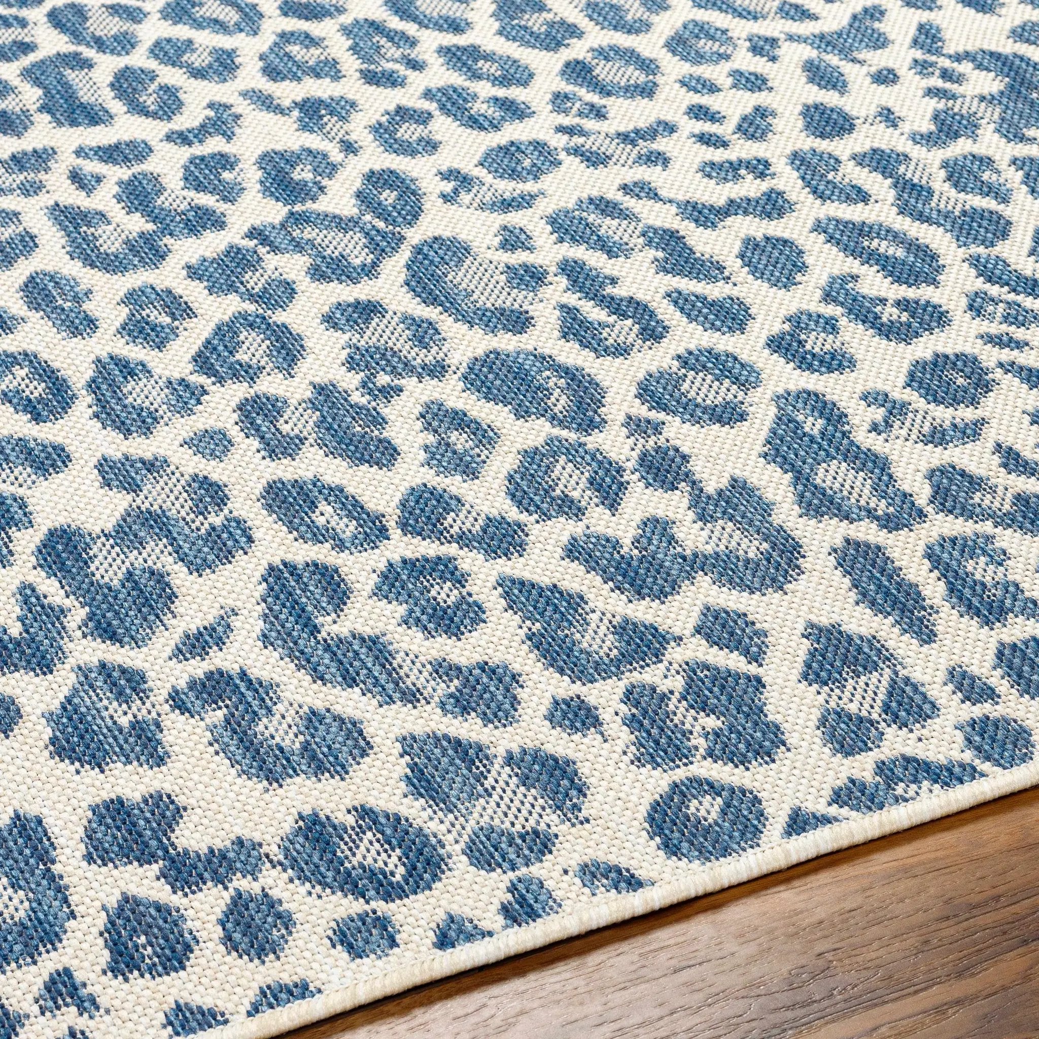 Garbo Blue Leopard Print Outdoor Area Rug - Clearance by Boutique Rugs