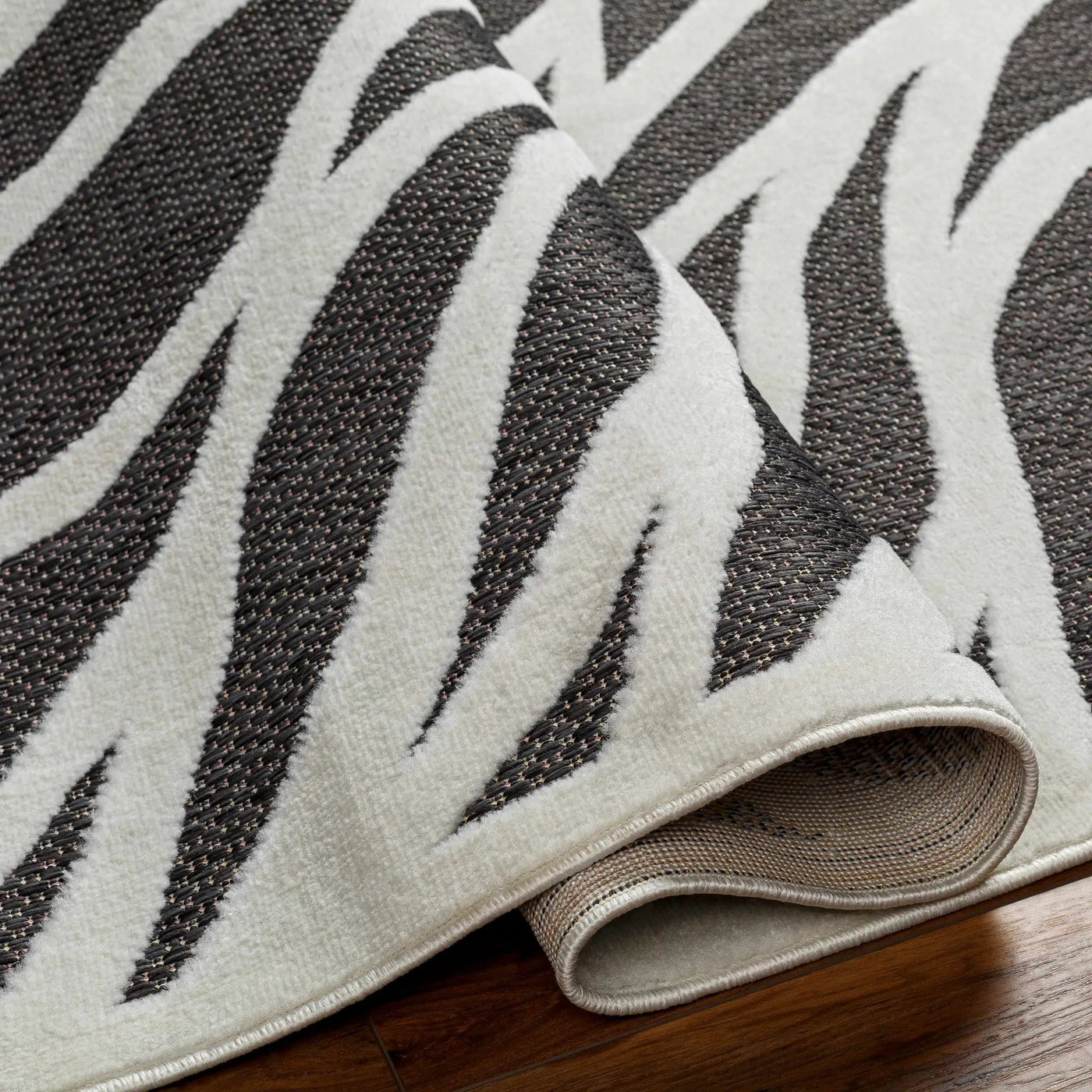 Astra Zebra Print Black Outdoor Rug - Clearance by Boutique Rugs
