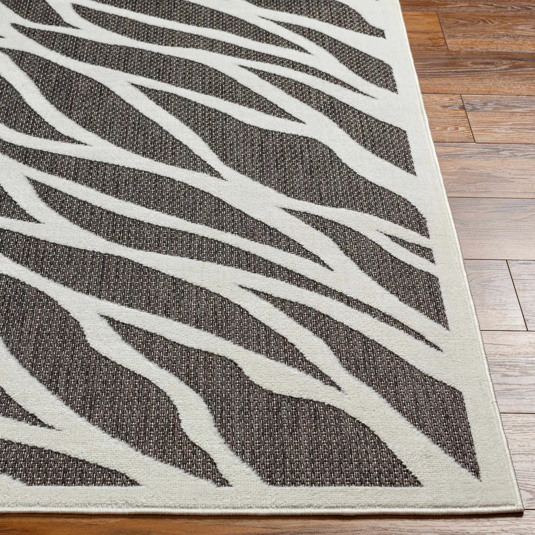 Astra Zebra Print Black Outdoor Rug - Clearance by Boutique Rugs