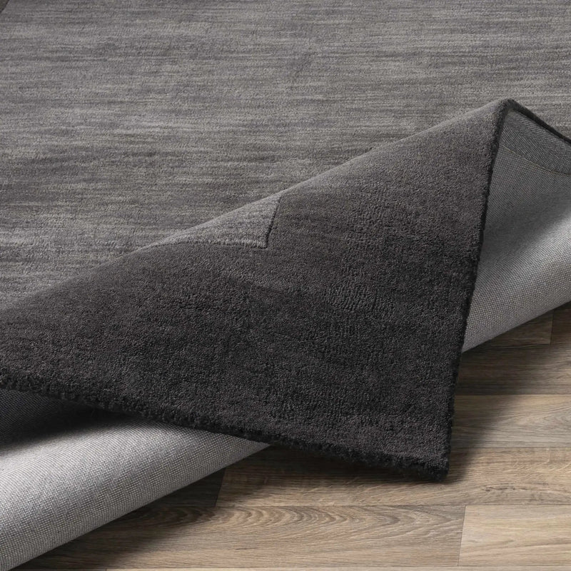 Bordered Solid Black Charcoal Wool Rug by Boutique Rugs