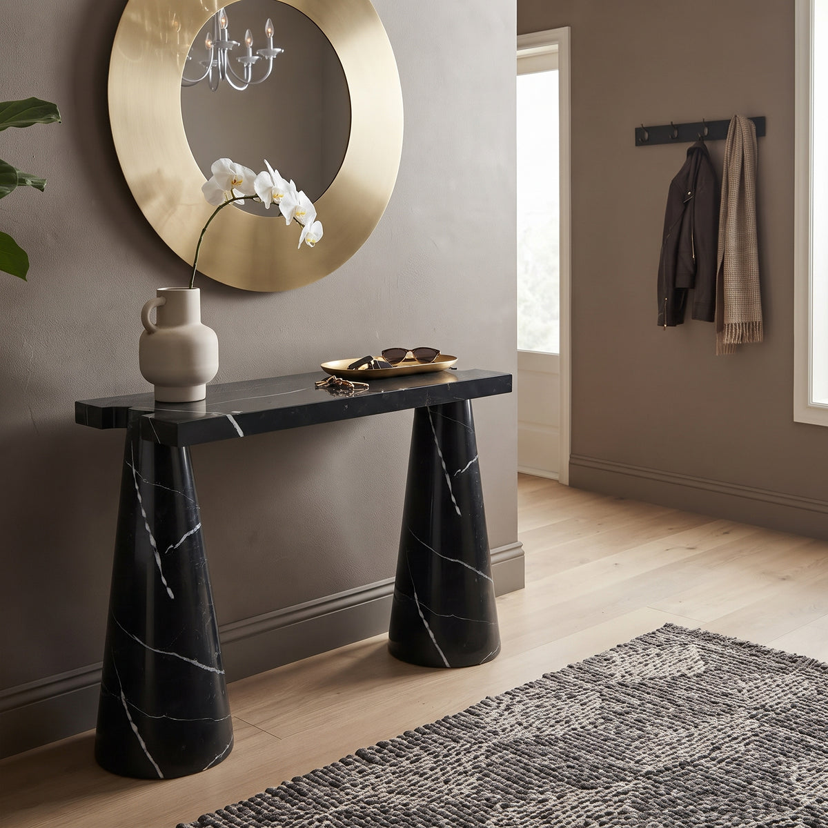 Black Marble Designer Console Table - Polished Cone Shape Legs, angled view