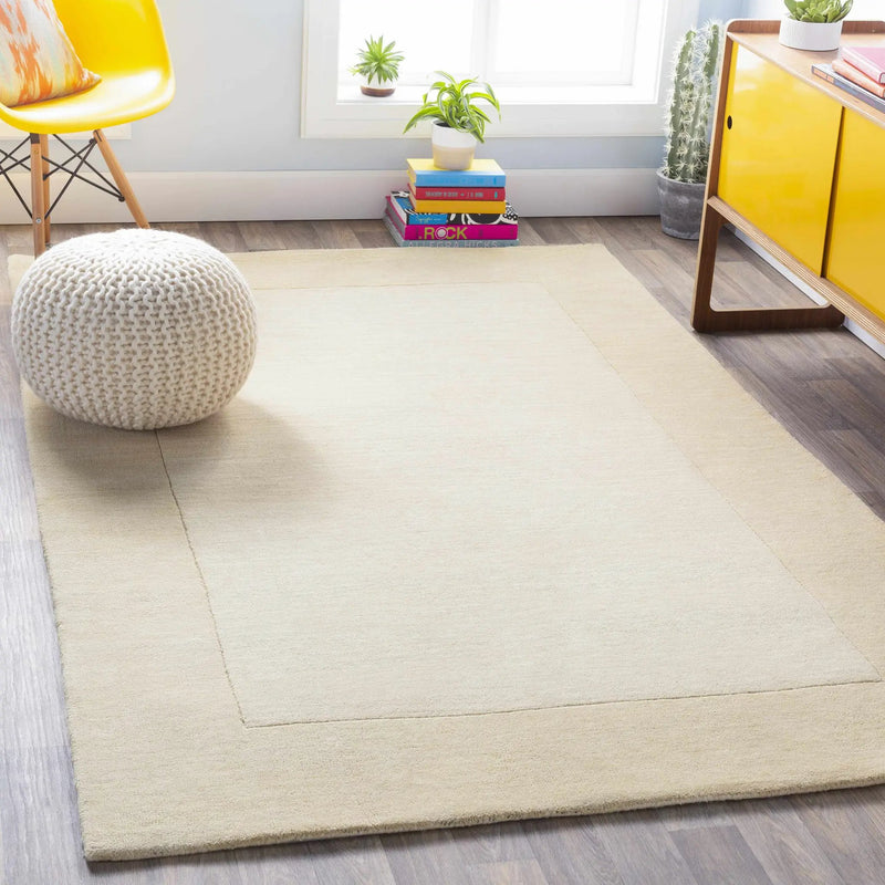 Bordered Solid Wheat Cream Wool Rug by Boutique Rugs