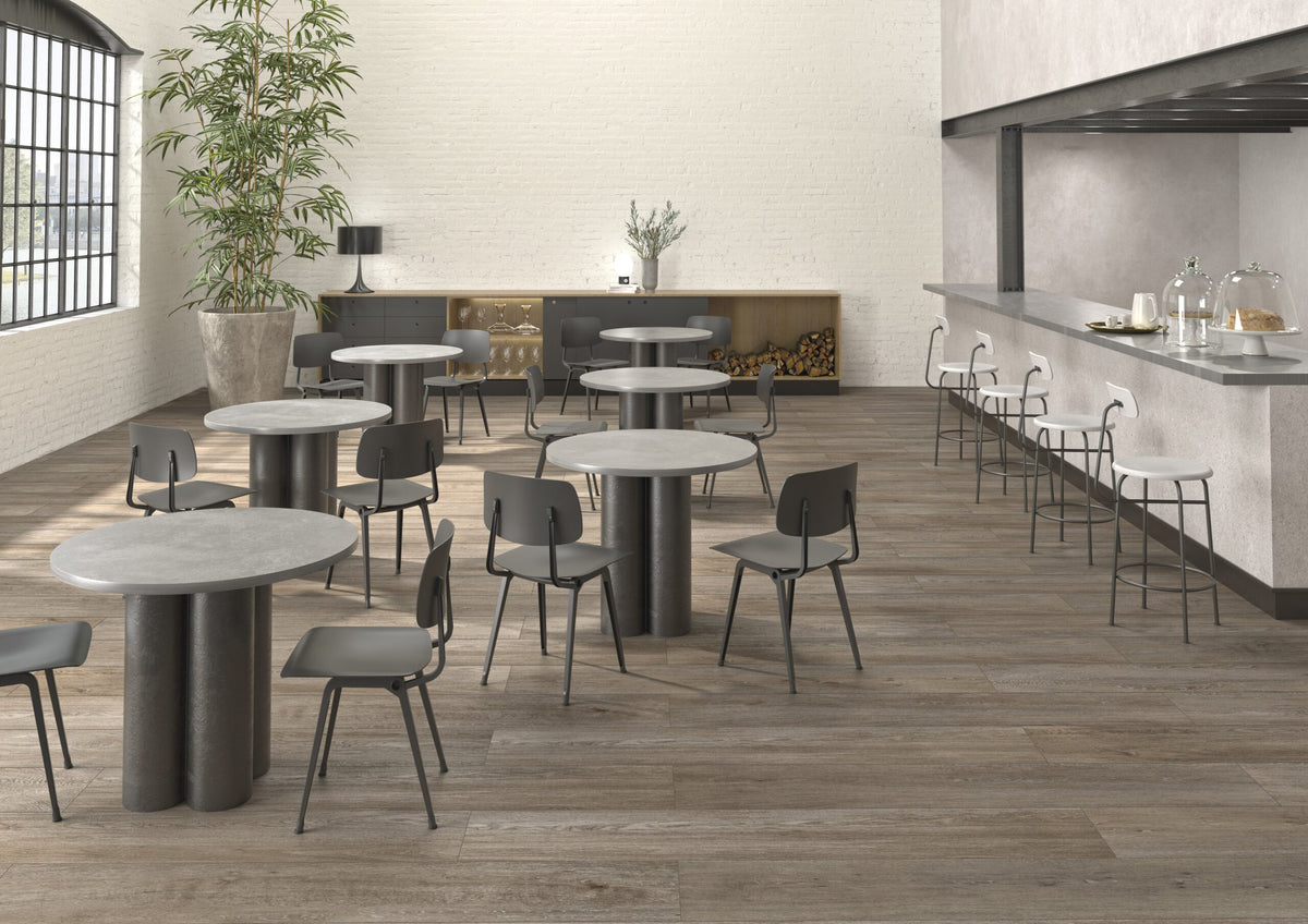 Venatura Bark Natural Plank Wood Look Porcelain Tiles 12x72 installed in a cafe