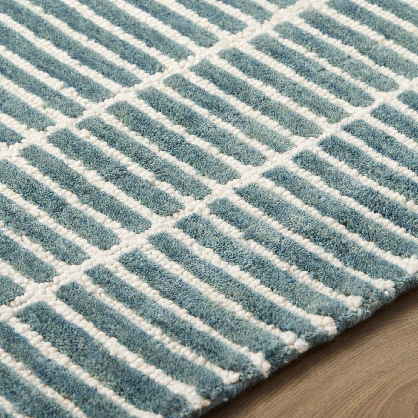 Finial Blue Wool Area Rug by Boutique Rugs