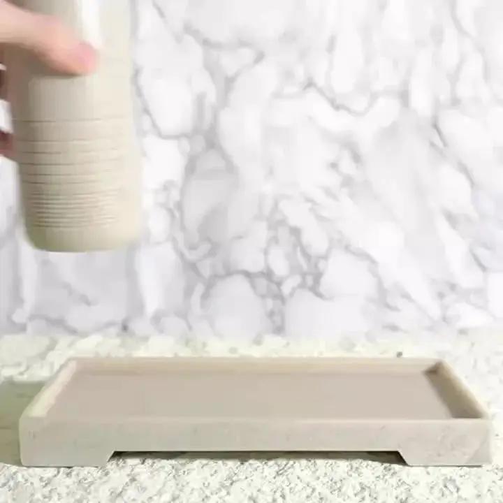White Crystal Sandstone Beige Gray Sandstone Featured Bathroom Four-Piece Set Lotion Bottle Toothbrush Holder Swab Box Tray by House Of Avana
