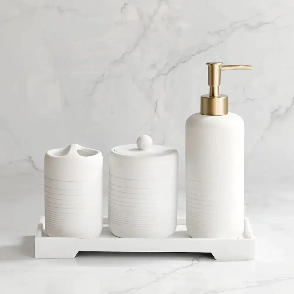 White Crystal Sandstone Beige Gray Sandstone Featured Bathroom Four-Piece Set Lotion Bottle Toothbrush Holder Swab Box Tray by House Of Avana