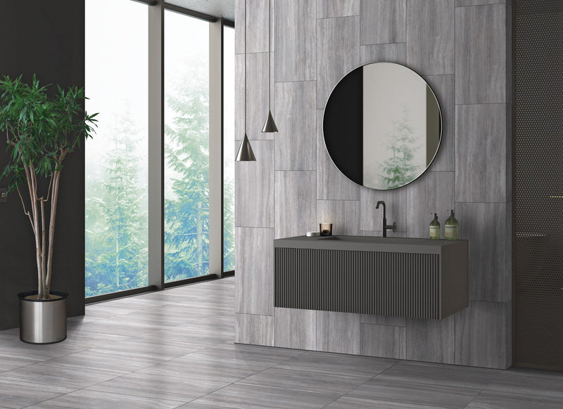 Zenit Grey Honed Travertine Look Bullnose Porcelain Trim 4x24 installed in a bathroom