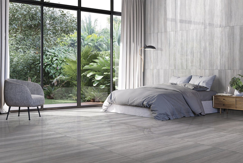 Zenit Grey Honed Travertine Look Porcelain Tiles 24x48 installed in a bedroom