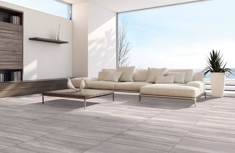 Zenit Light Taupe Honed Travertine Look Bullnose Porcelain Trim 4x24 installed in a living room
